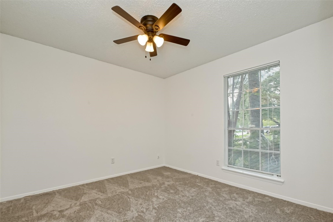 5302 Oaklynn Drive Spring, TX 77373 - Photo 9 of 15 an empty room with a window