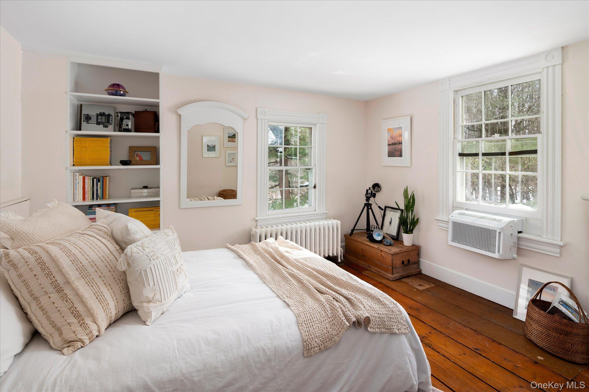 28 Barnes Road Ossining, NY 10562 - Photo 14 of 34 a bedroom with a bed wooden floor and window