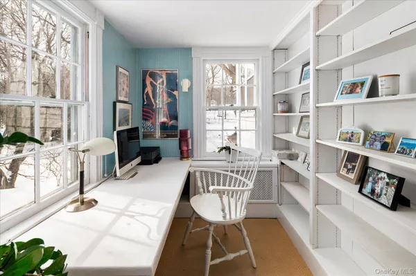 a view of a livingroom with furniture and front door