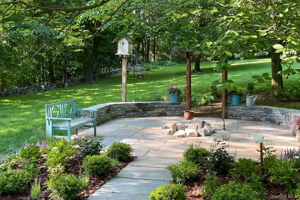 a view of a park with large trees