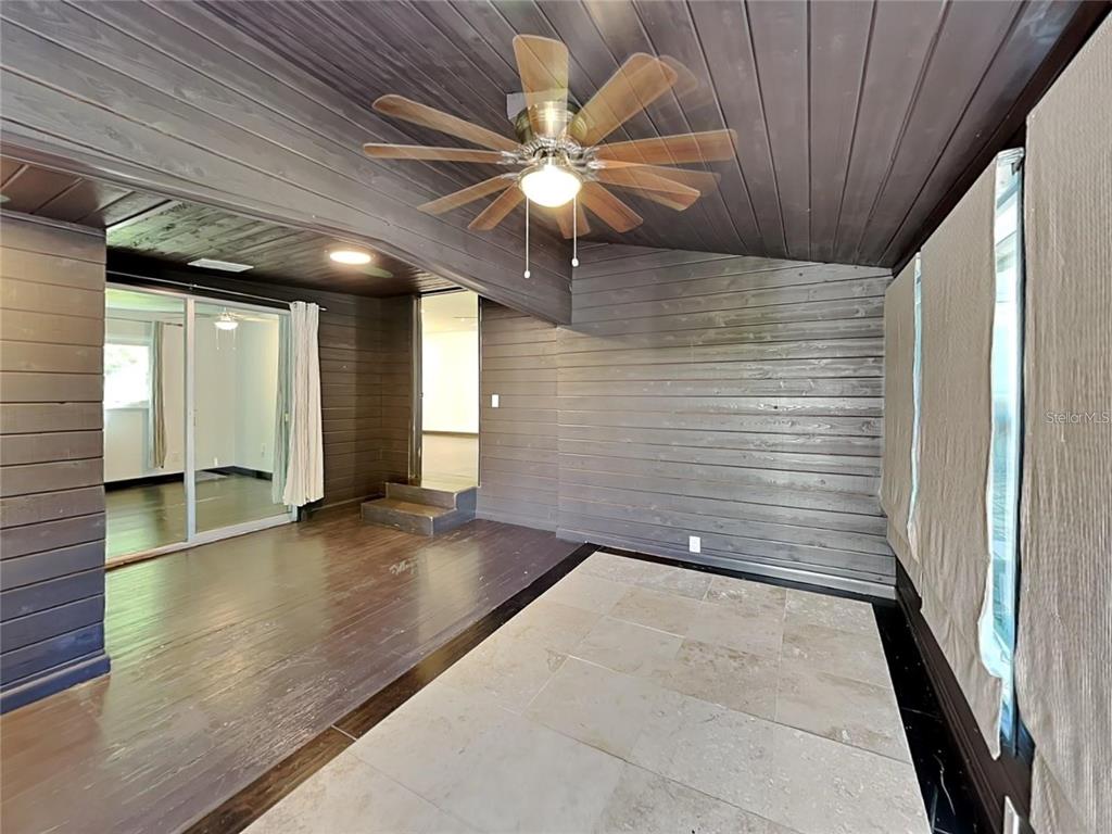 10140 Lake Louisa Road, Unit A Clermont, FL 34711 - Photo 12 of 18 a view of a hallway with a ceiling fan
