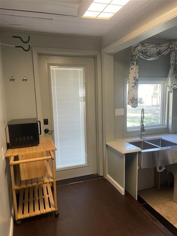 10140 Lake Louisa Road, Unit A Clermont, FL 34711 - Photo 15 of 18 a room with storage and utility