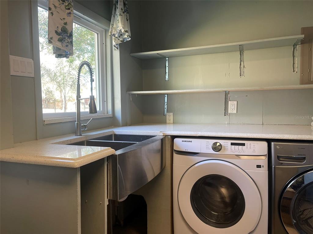 10140 Lake Louisa Road, Unit A Clermont, FL 34711 - Photo 16 of 18 a view of a kitchen with furniture and window