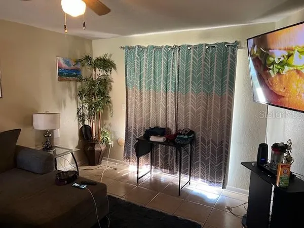 a kitchen with a table and chairs in it