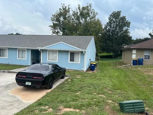 a house view with a garden space