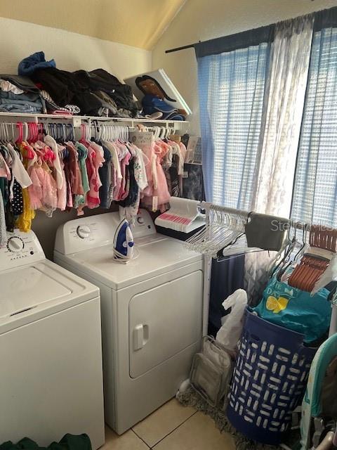 209 Ridge Crest Loop Minneola, FL 34715 - Photo 31 of 33 a utility room with dryer and washer