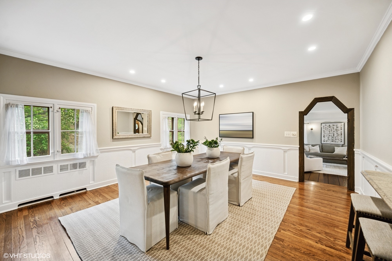1487 Tower Road Winnetka, IL 60093 - Photo 16 of 45 a view of a dining room with furniture window and wooden floor