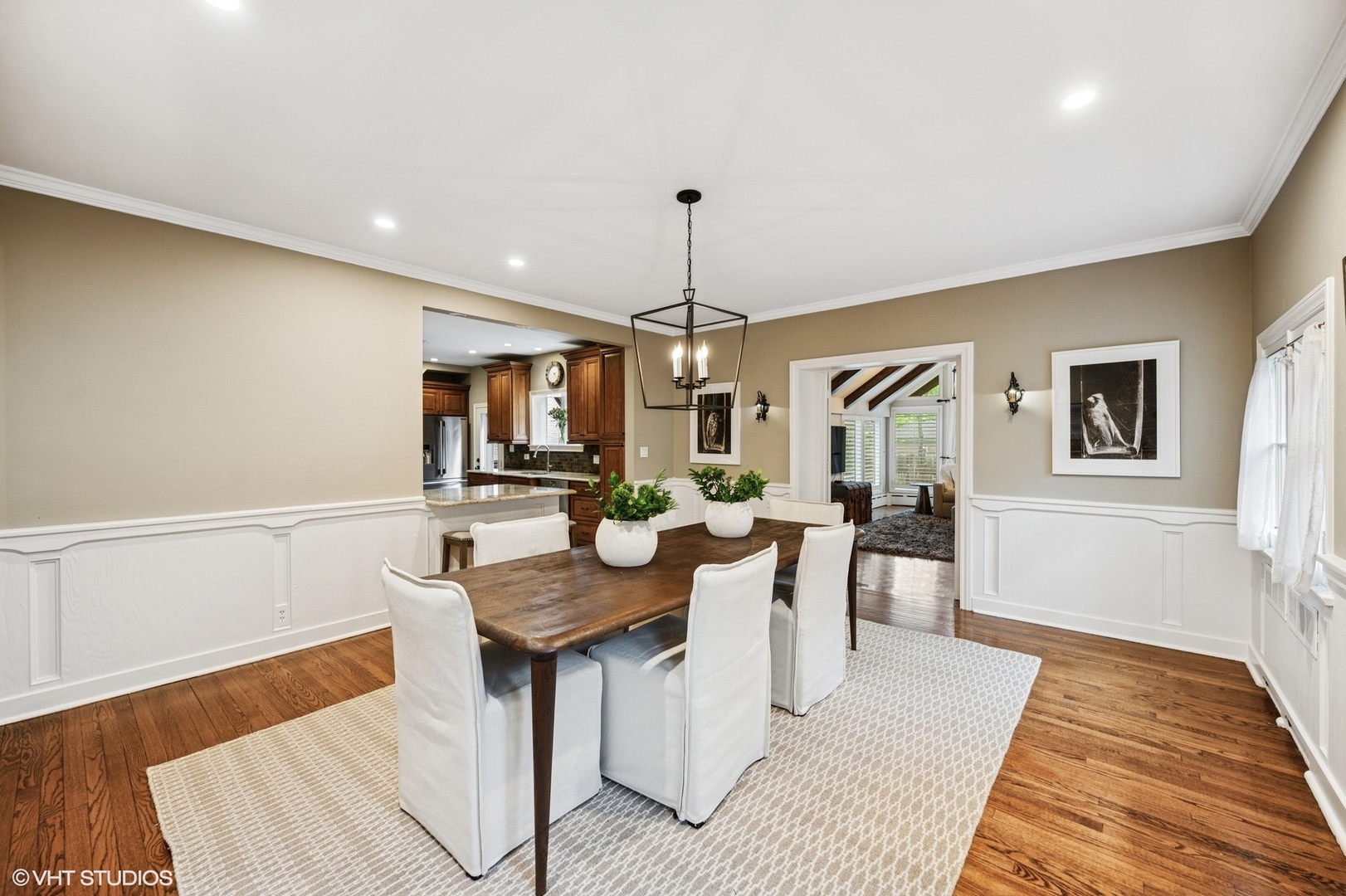 1487 Tower Road Winnetka, IL 60093 - Photo 18 of 45 a view of a a dining room with furniture window and wooden floor