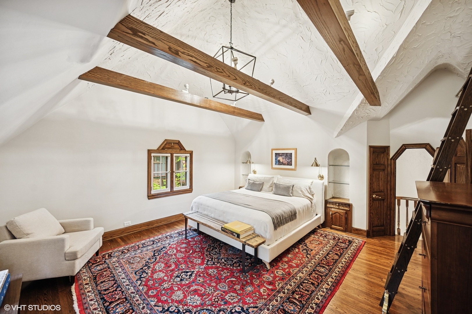 1487 Tower Road Winnetka, IL 60093 - Photo 30 of 45 a bedroom with a bed and a large mirror on the dresser