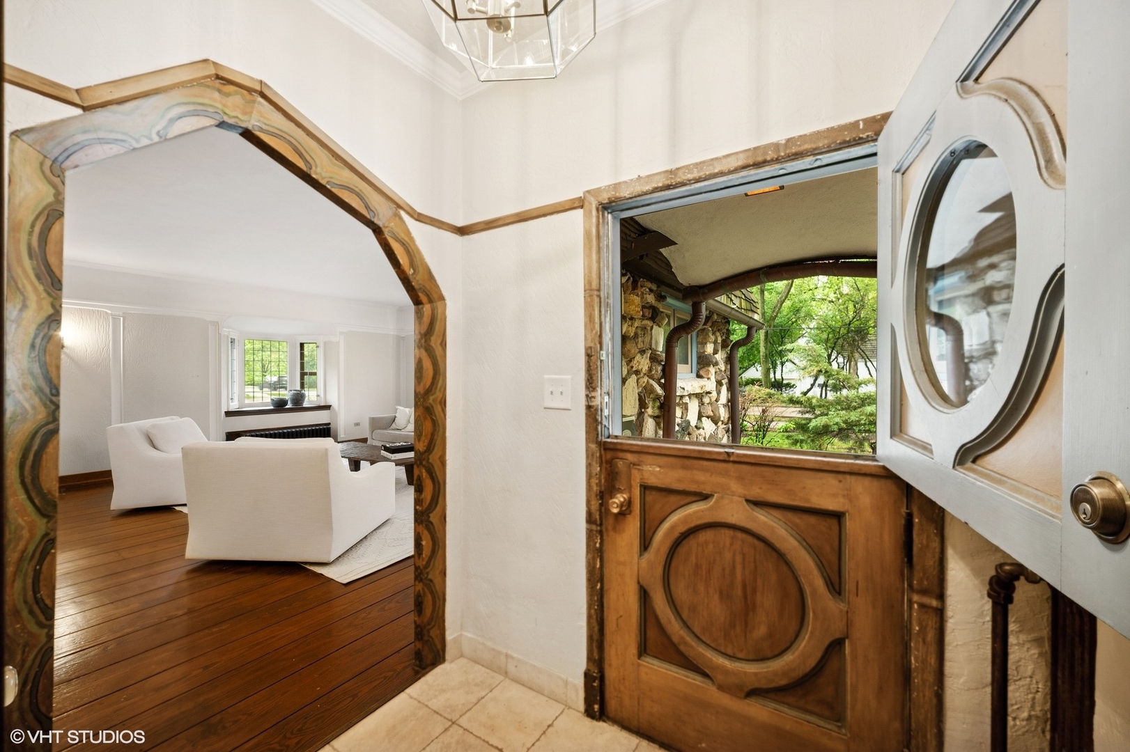 1487 Tower Road Winnetka, IL 60093 - Photo 3 of 45 a view of a hallway with washer and dryer
