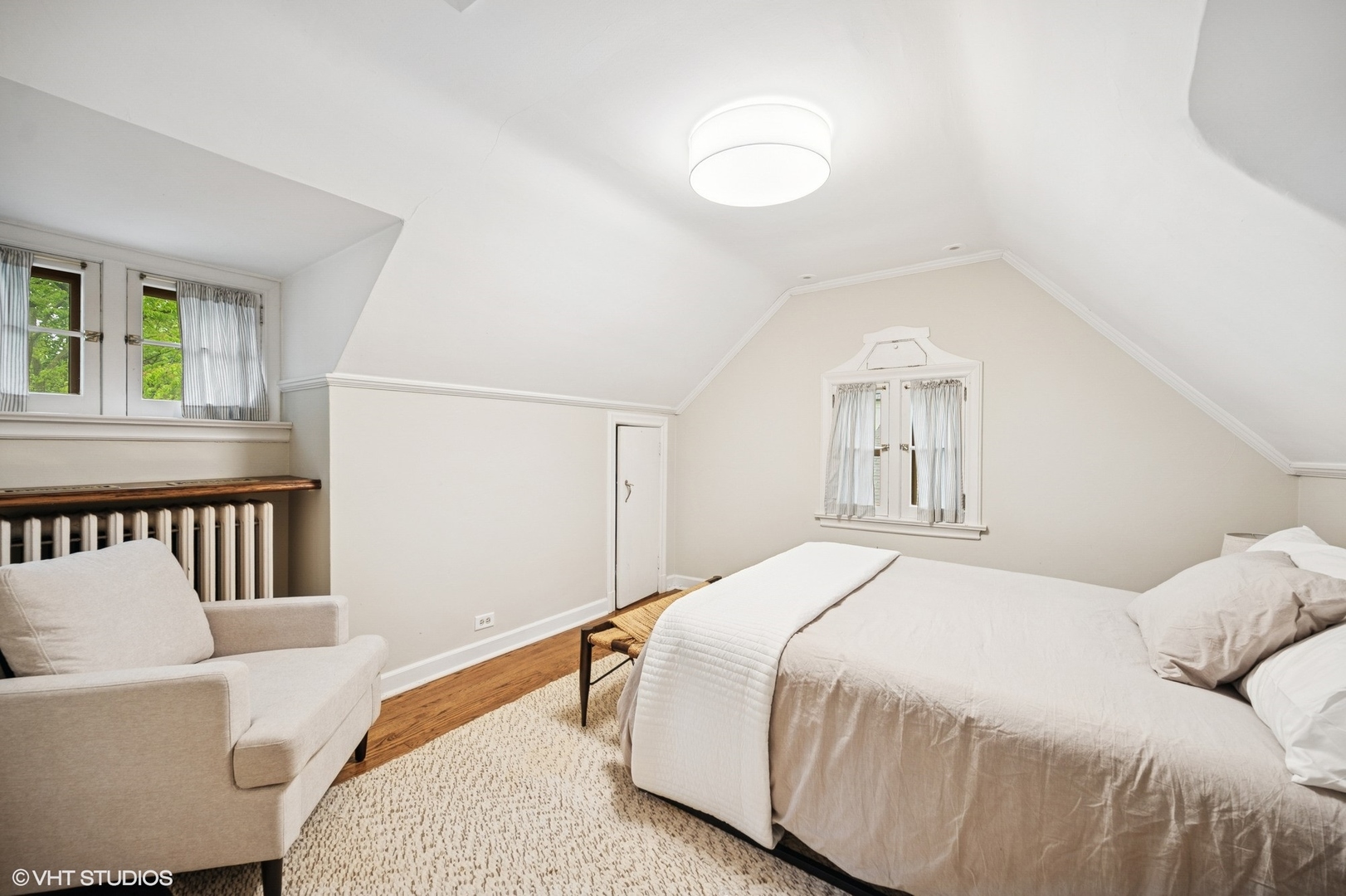 1487 Tower Road Winnetka, IL 60093 - Photo 33 of 45 a bedroom with a bed and a couch