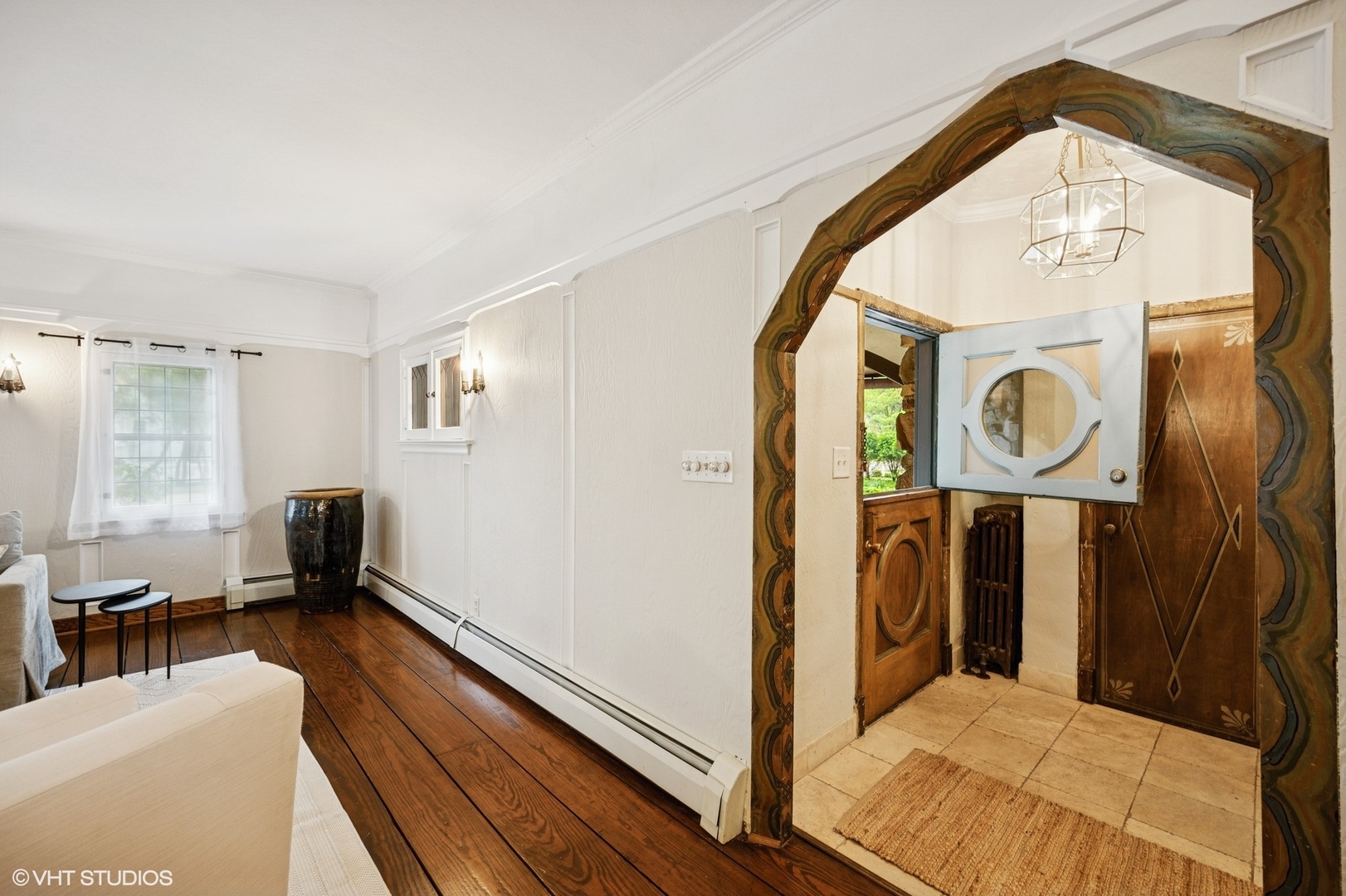 1487 Tower Road Winnetka, IL 60093 - Photo 4 of 45 a view of a hallway with washer and dryer