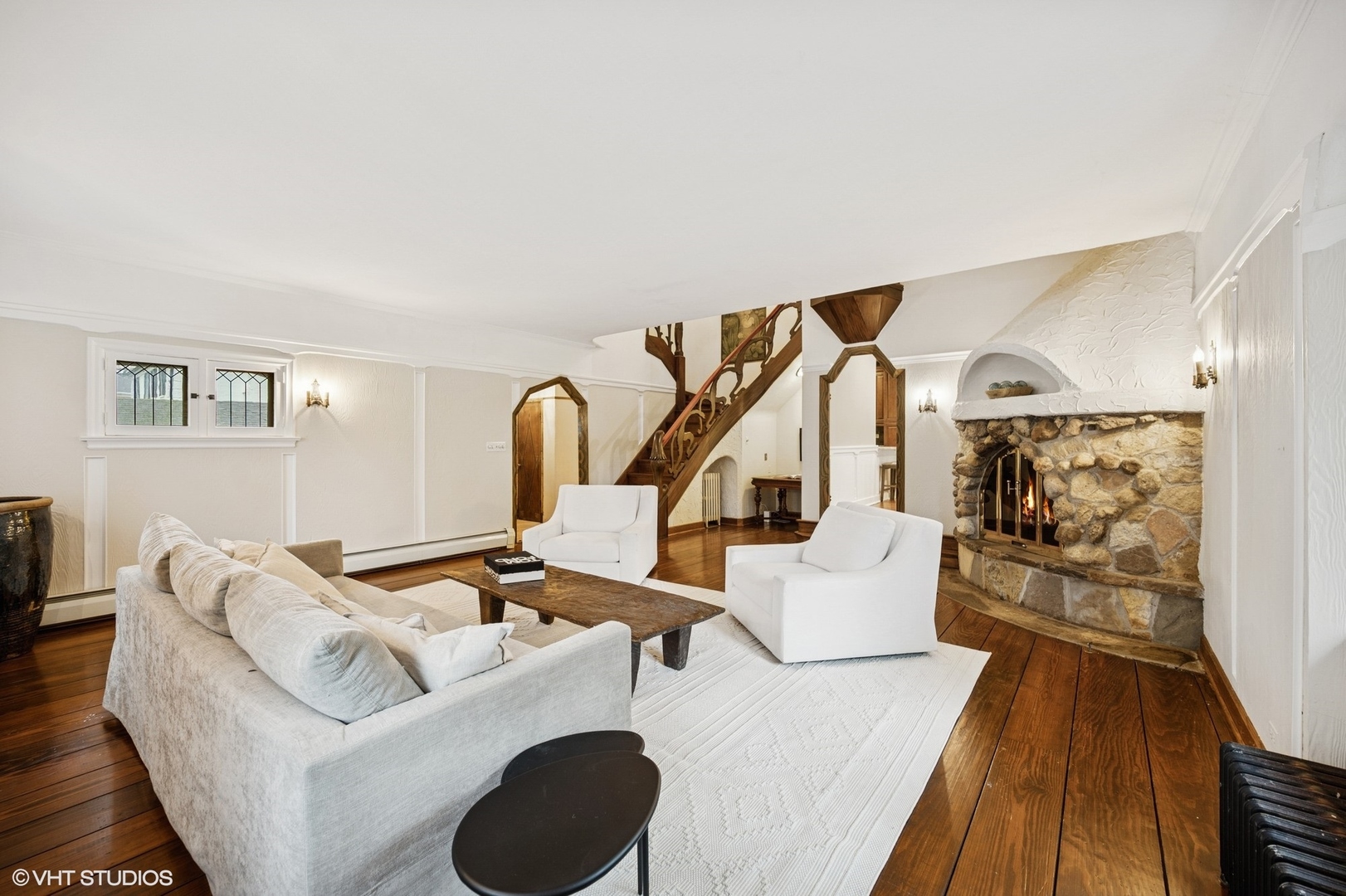 1487 Tower Road Winnetka, IL 60093 - Photo 10 of 45 a living room with furniture and a wooden floor