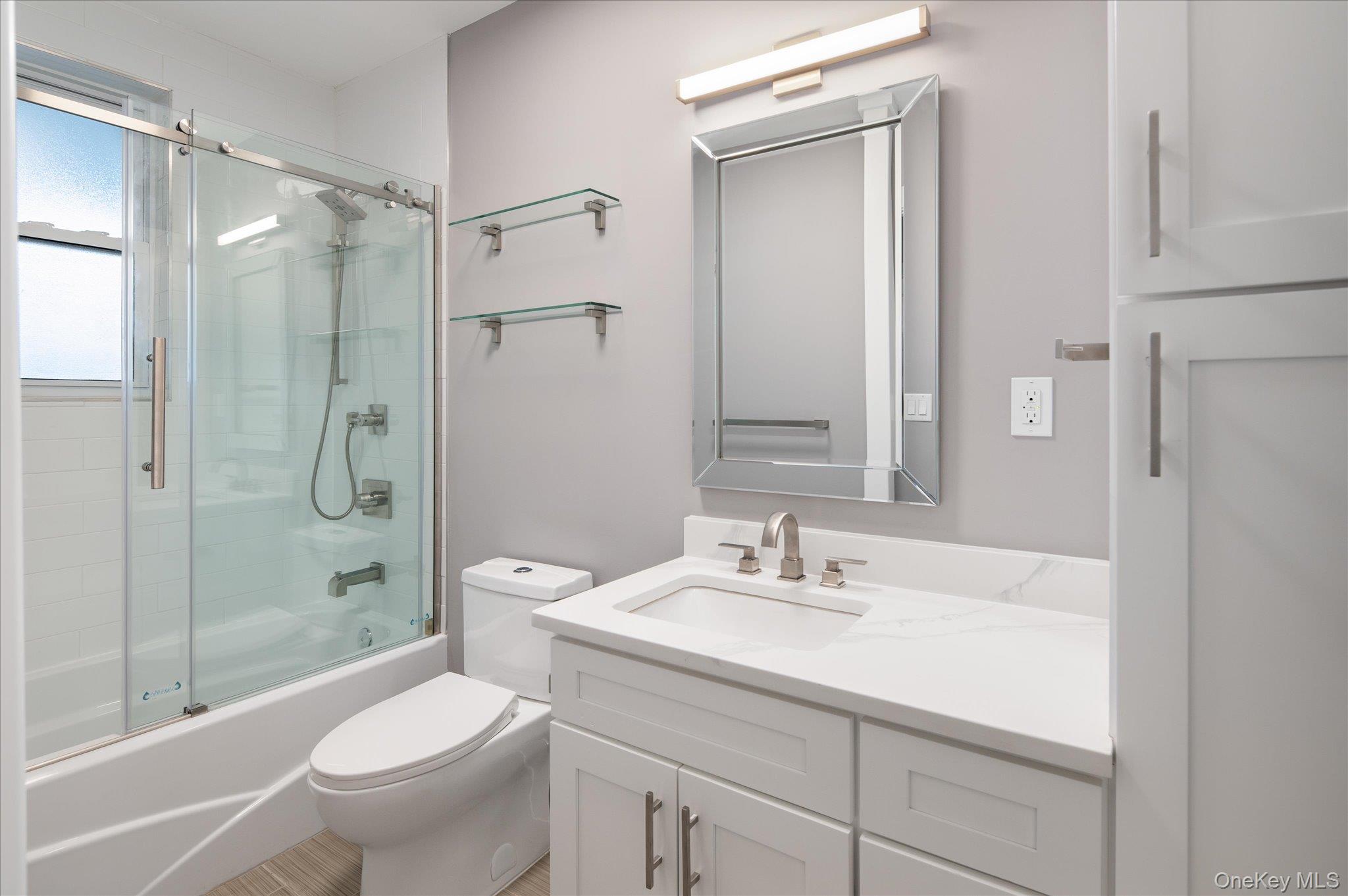 1133 Midland Avenue, Unit 4C Bronxville, NY 10708 - Photo 12 of 30 a bathroom with a sink toilet and shower