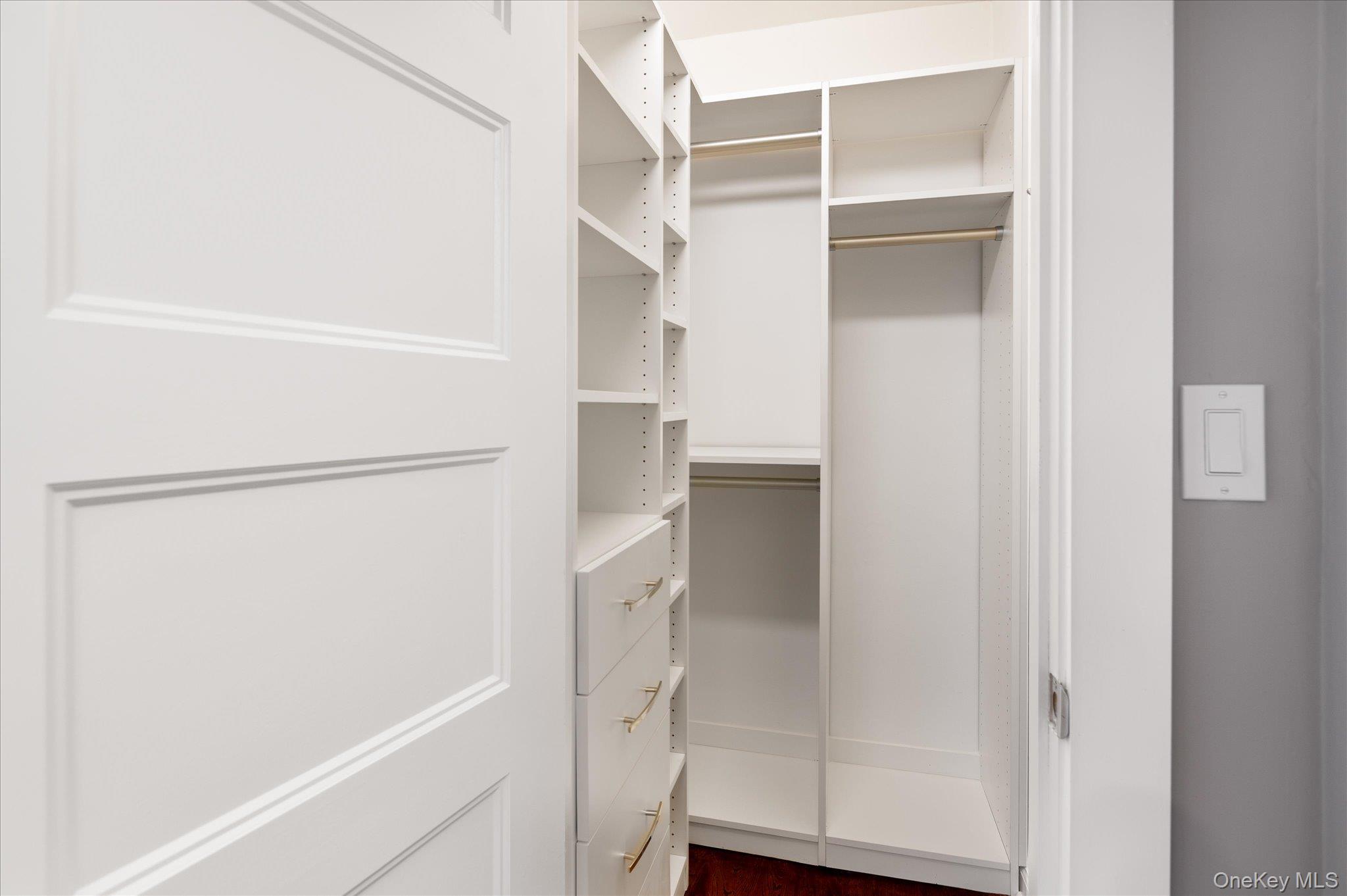 1133 Midland Avenue, Unit 4C Bronxville, NY 10708 - Photo 18 of 30 a view of walk in closet with empty racks