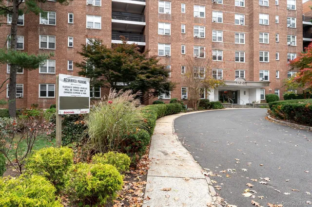 a front view of a multi story residential apartment building