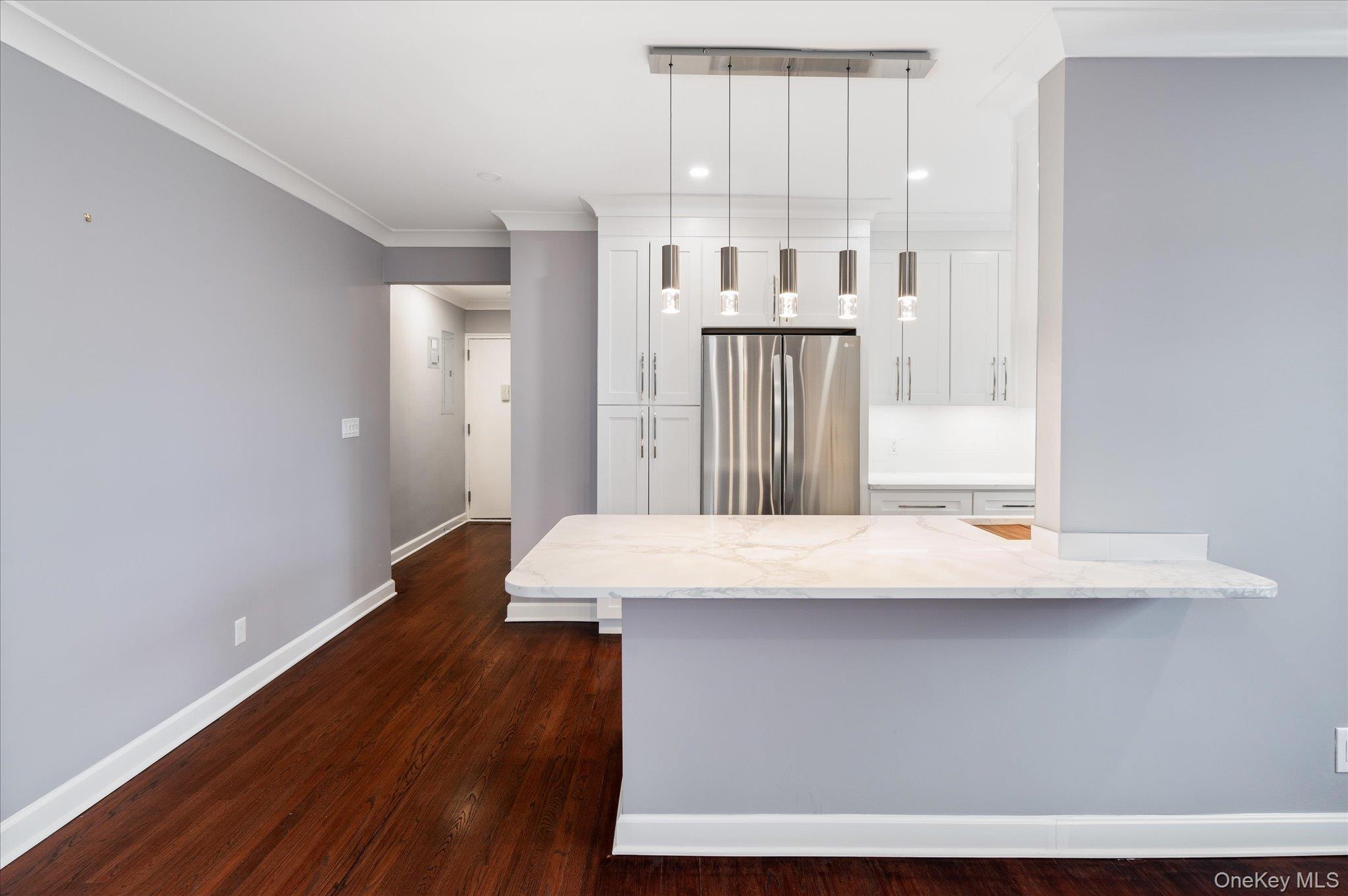 1133 Midland Avenue, Unit 4C Bronxville, NY 10708 - Photo 7 of 30 a view of a hallway with wooden floor