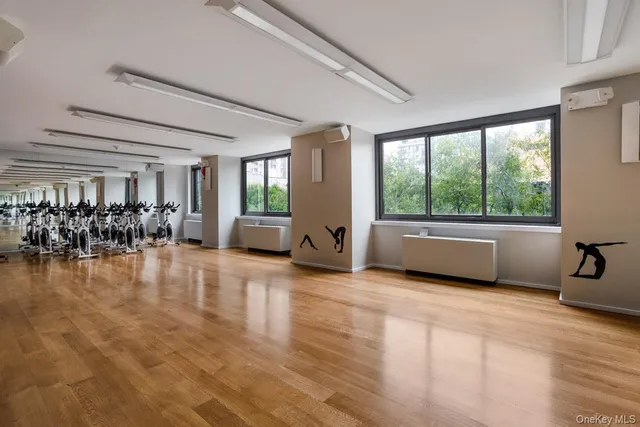 a view of a living room and chandelier