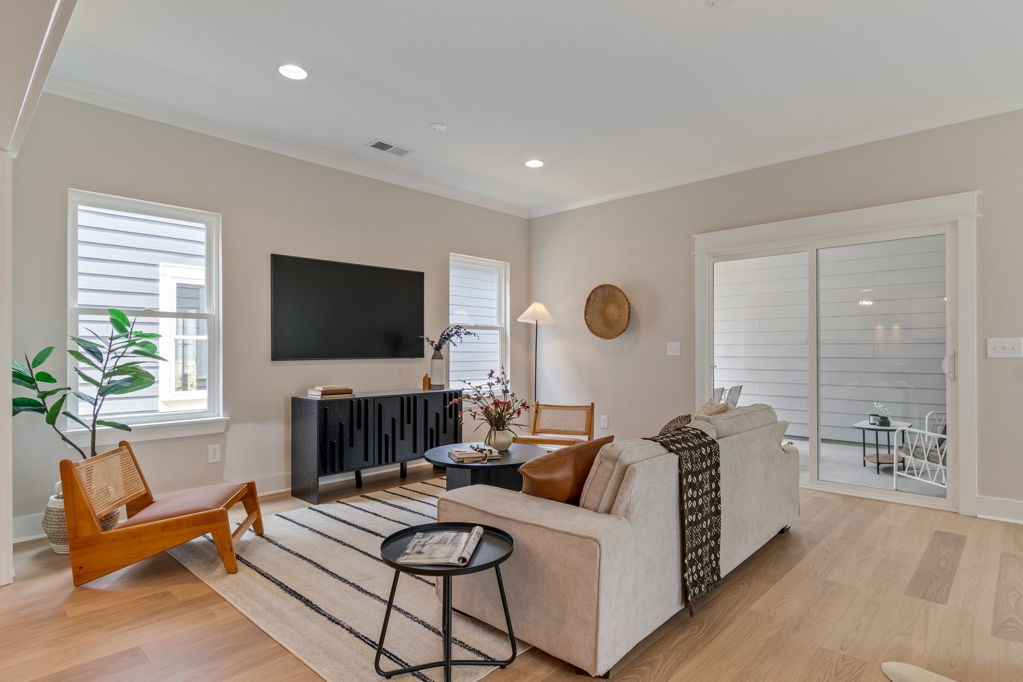 317 Delta Way La Vergne, TN 37086 - Photo 3 of 40 a living room with furniture and a flat screen tv