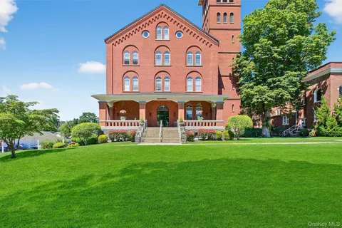 a view of a building with a garden