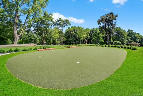 a view of a golf course with a garden