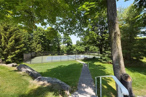 a view of a golf course with a lake