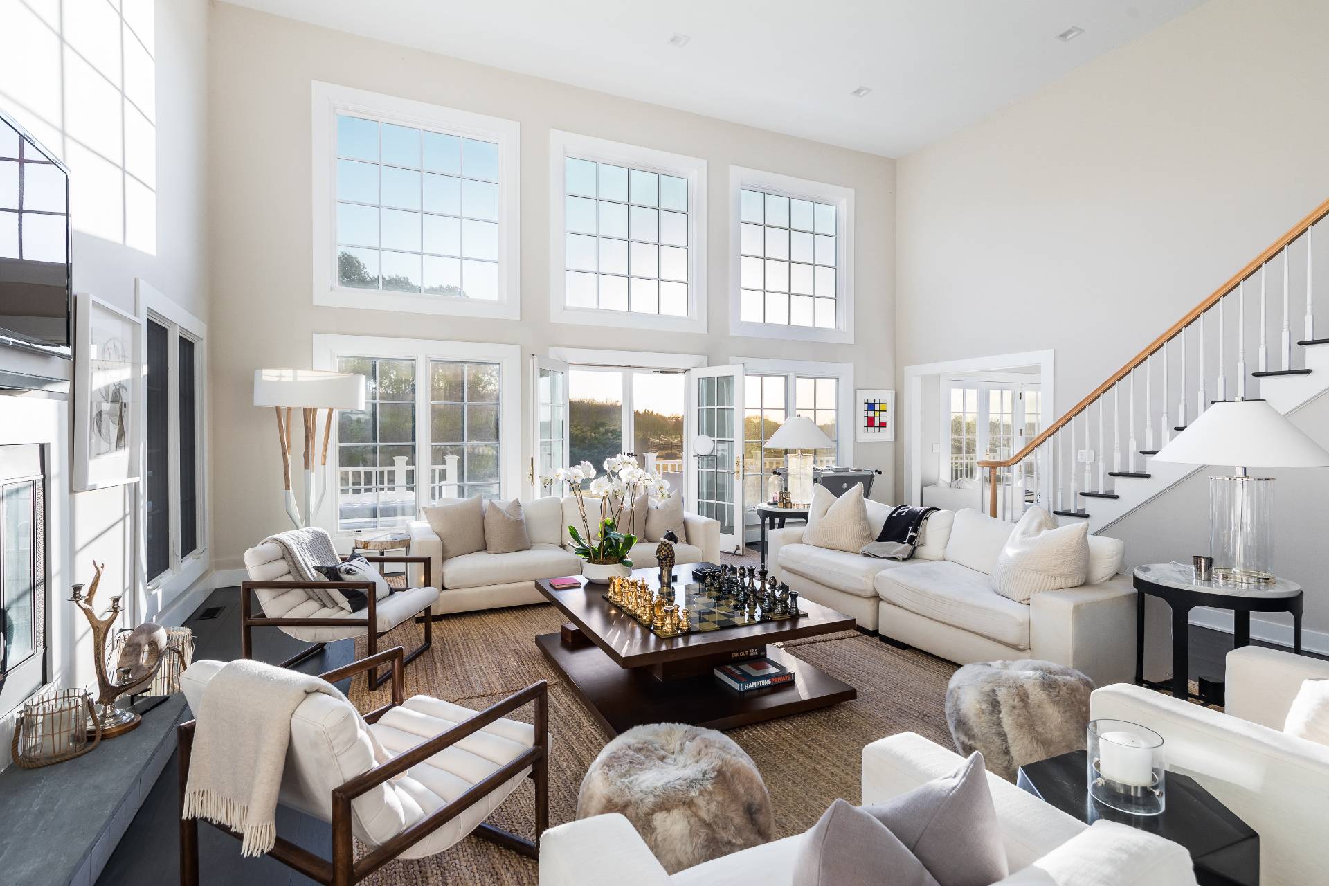 Undisclosed Address Bridgehampton, NY 11932 - Photo 4 of 22 a living room with furniture and a large window