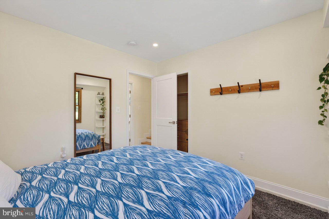 202 Lake Arrowhead Road Luray, VA 22835 - Photo 15 of 47 a bedroom with a bed and a dresser