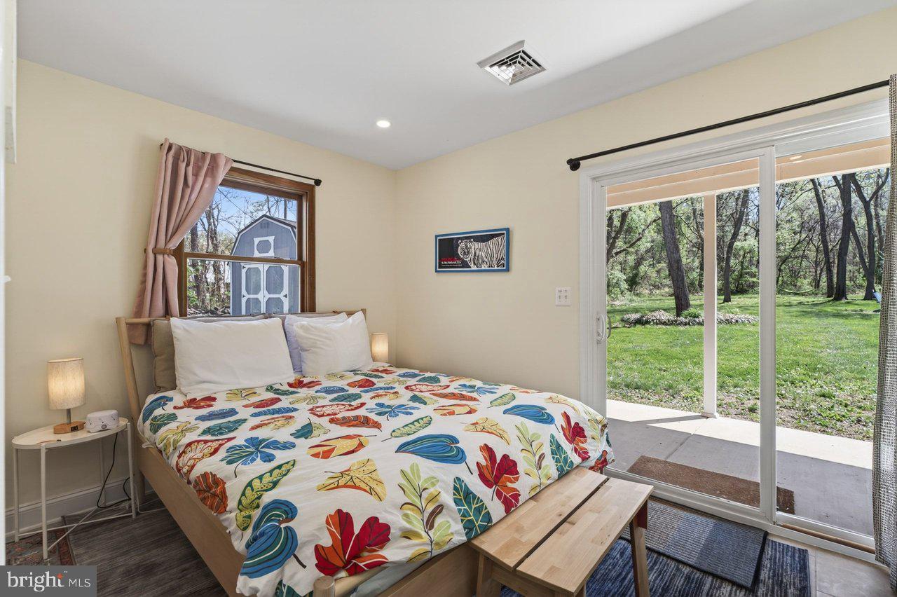 202 Lake Arrowhead Road Luray, VA 22835 - Photo 16 of 47 a bedroom with a bed and a large window