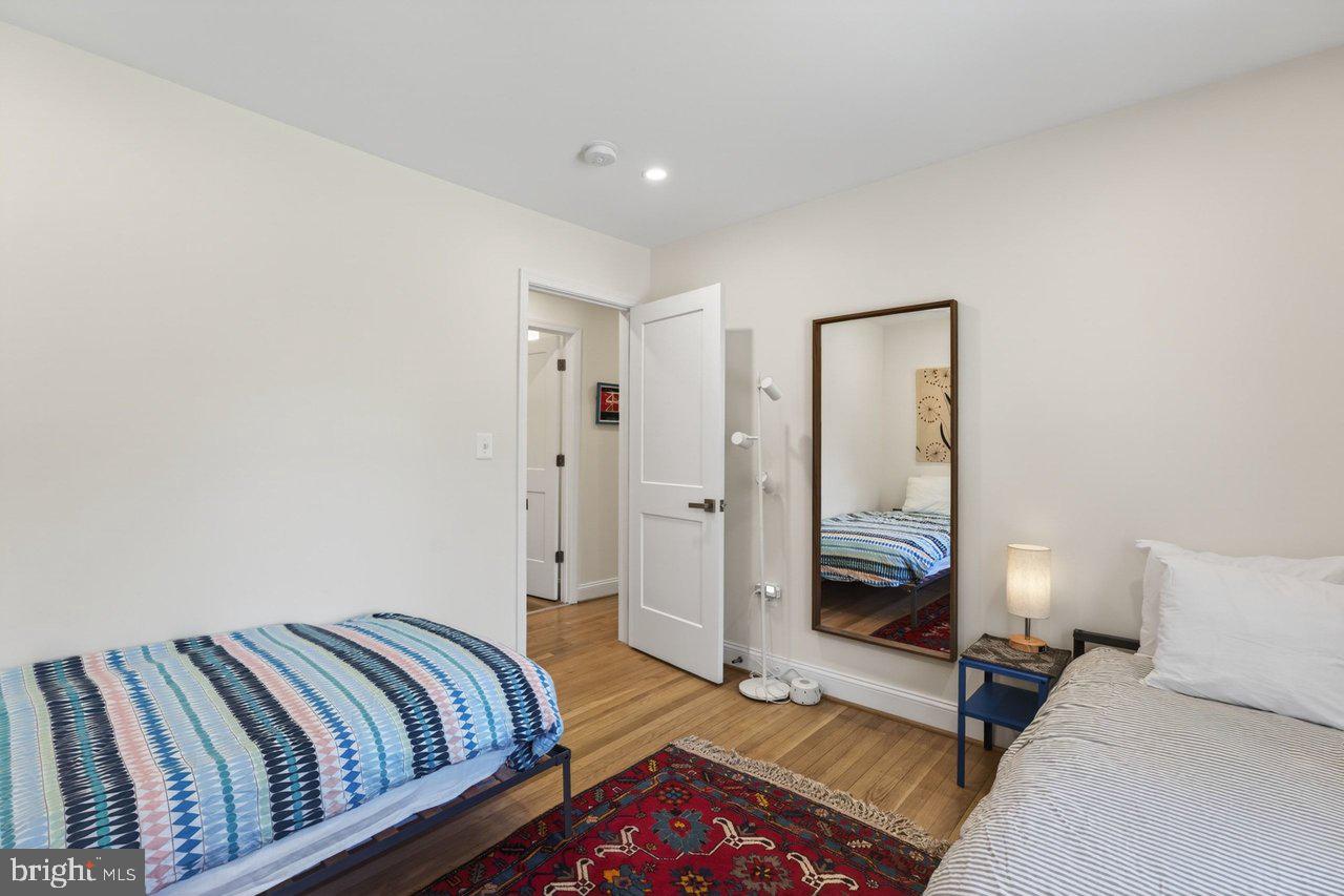 202 Lake Arrowhead Road Luray, VA 22835 - Photo 19 of 47 a bedroom with a bed and a lamp