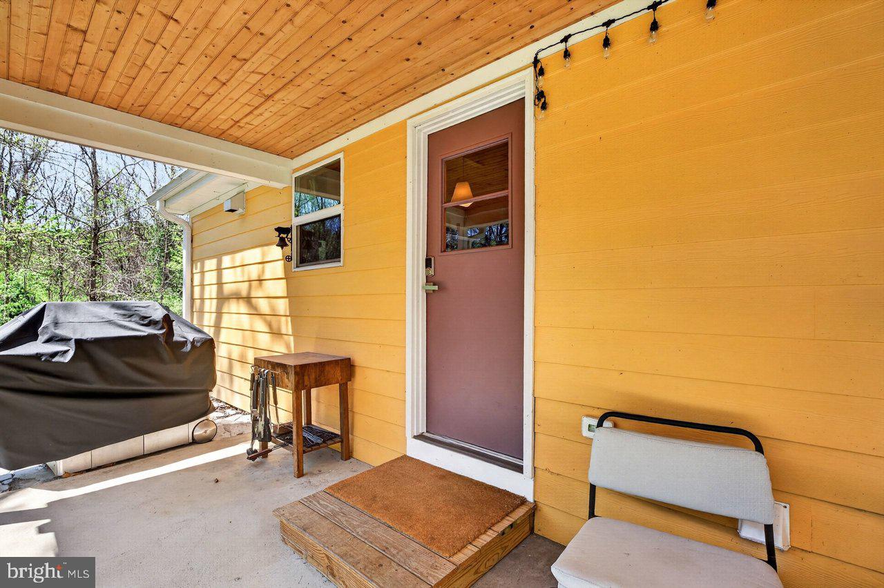 202 Lake Arrowhead Road Luray, VA 22835 - Photo 26 of 47 a view of a door and chair in the front of a house
