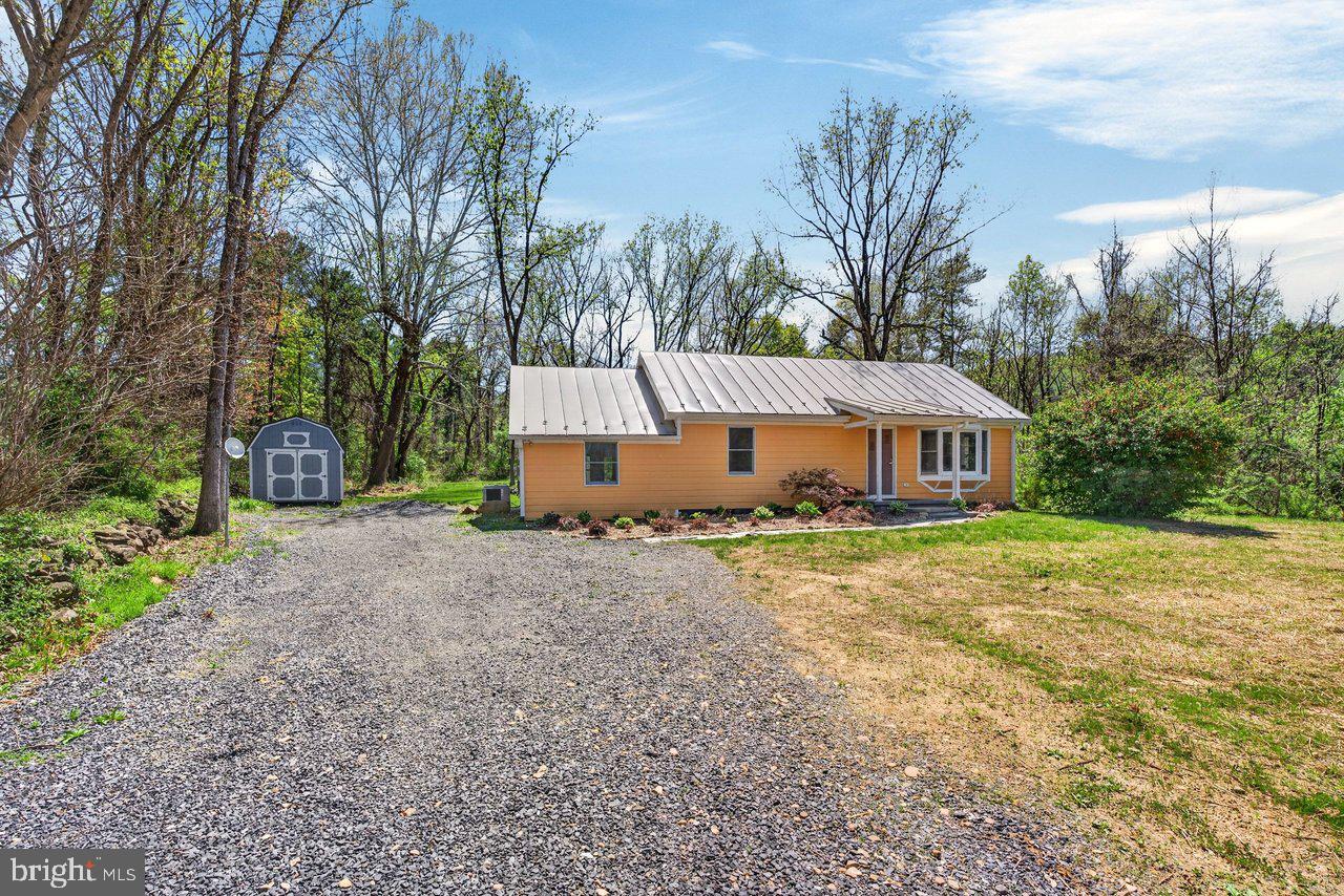 202 Lake Arrowhead Road Luray, VA 22835 - Photo 30 of 47 a front view of a house with yard and trees