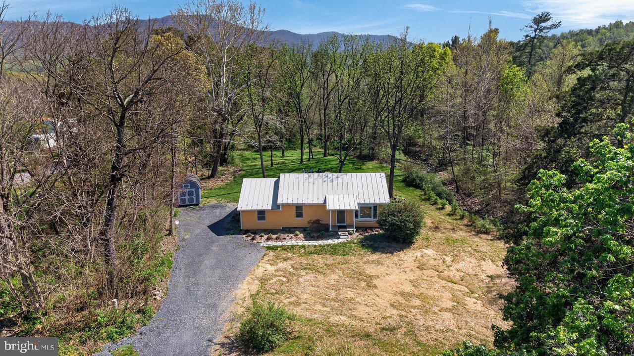 202 Lake Arrowhead Road Luray, VA 22835 - Photo 32 of 47 an aerial view of a house with a yard
