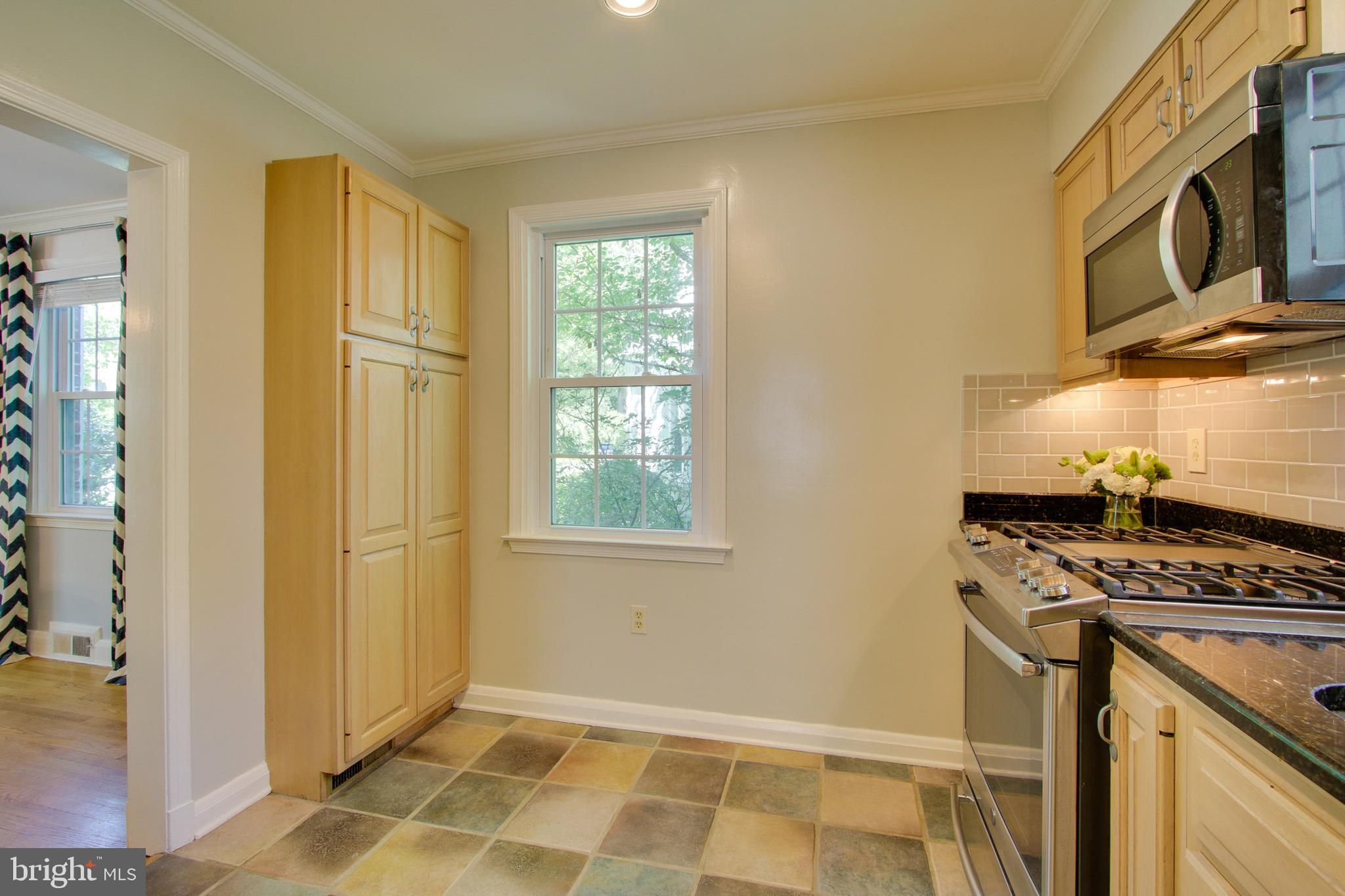 607 Worcester Road Baltimore, MD 21286 - Photo 19 of 42 a view of a kitchen with a stove top oven