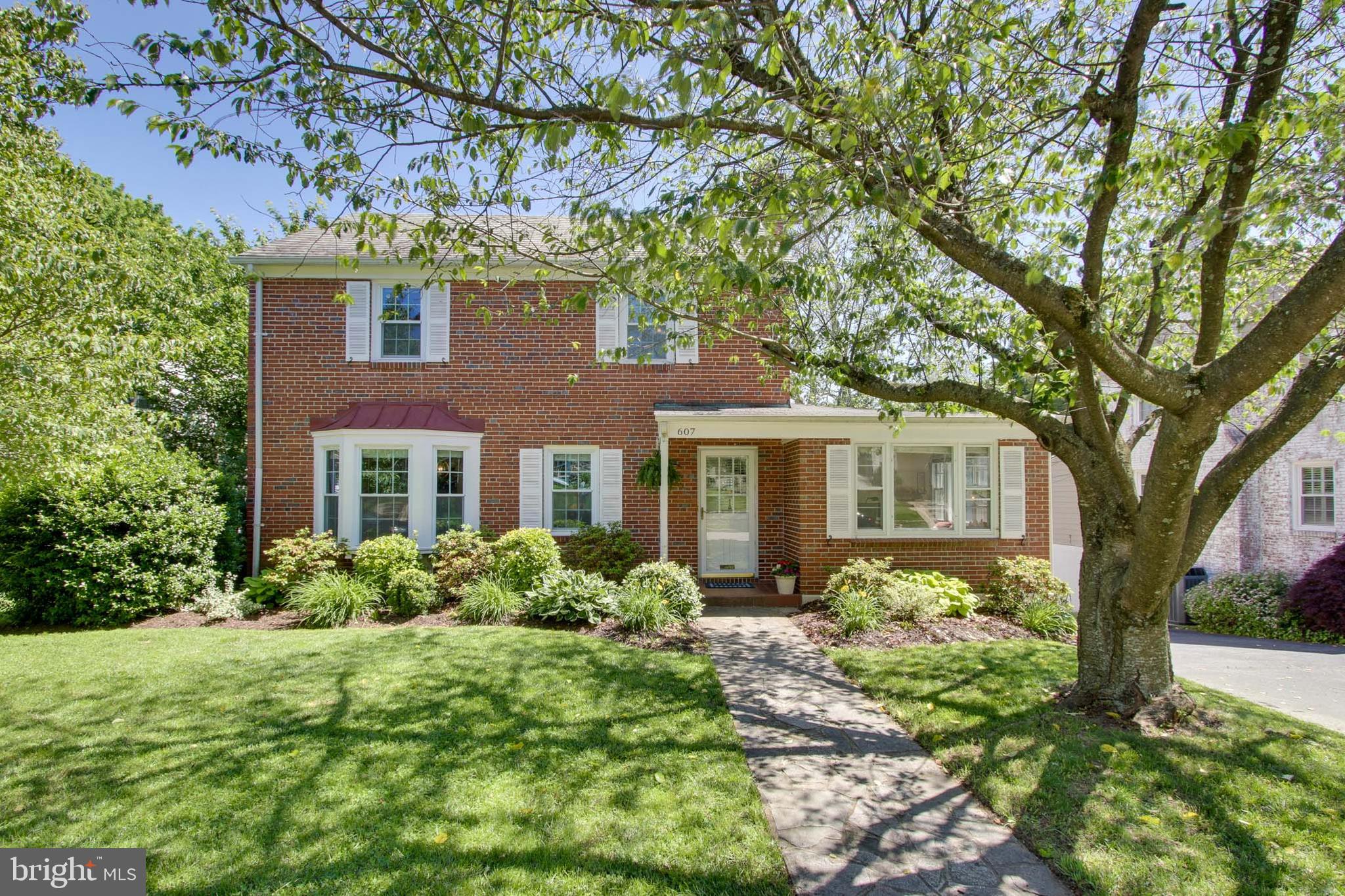 607 Worcester Road Baltimore, MD 21286 - Photo 3 of 42 a front view of a house with garden