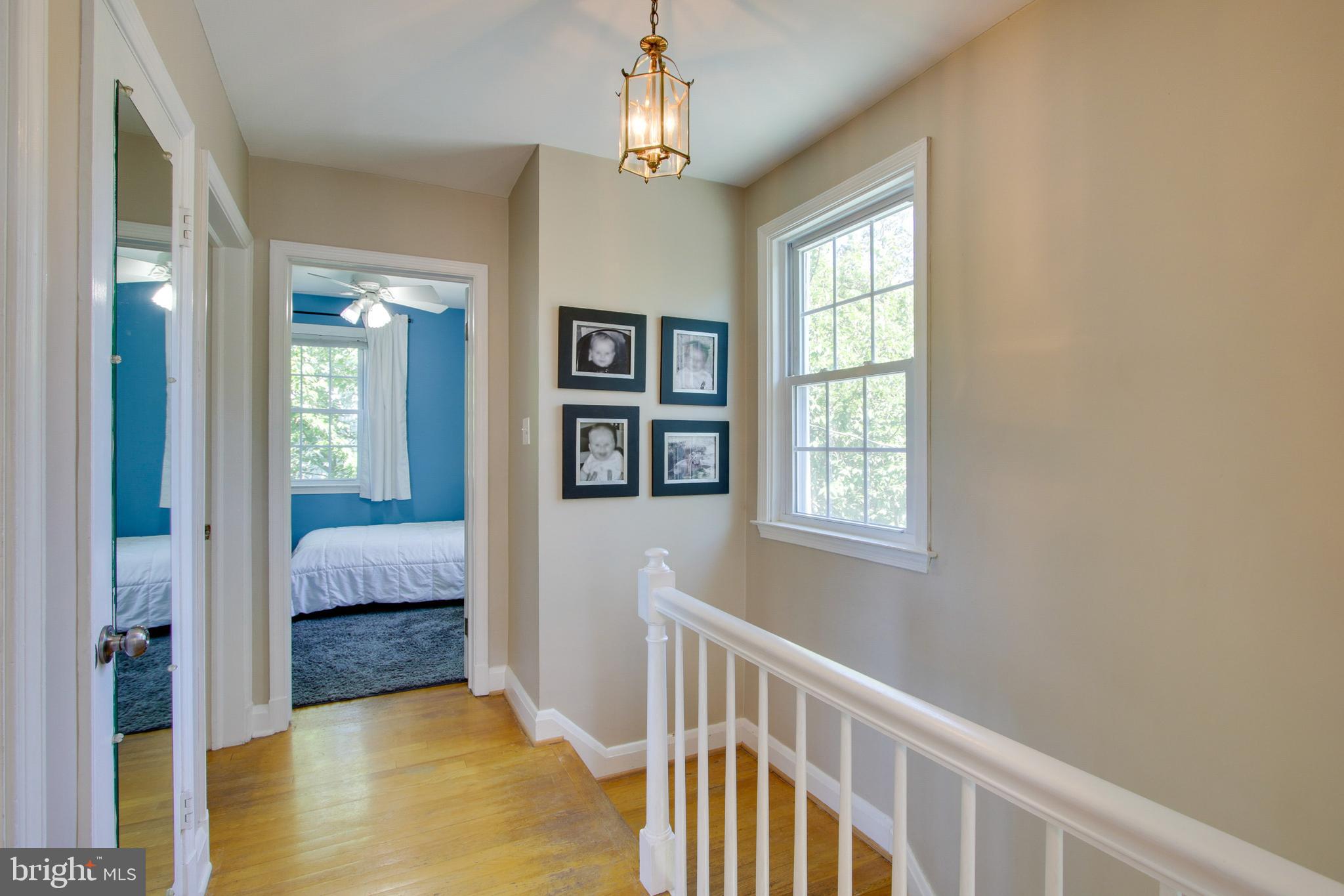 607 Worcester Road Baltimore, MD 21286 - Photo 29 of 42 a view of a bedroom with wooden floor