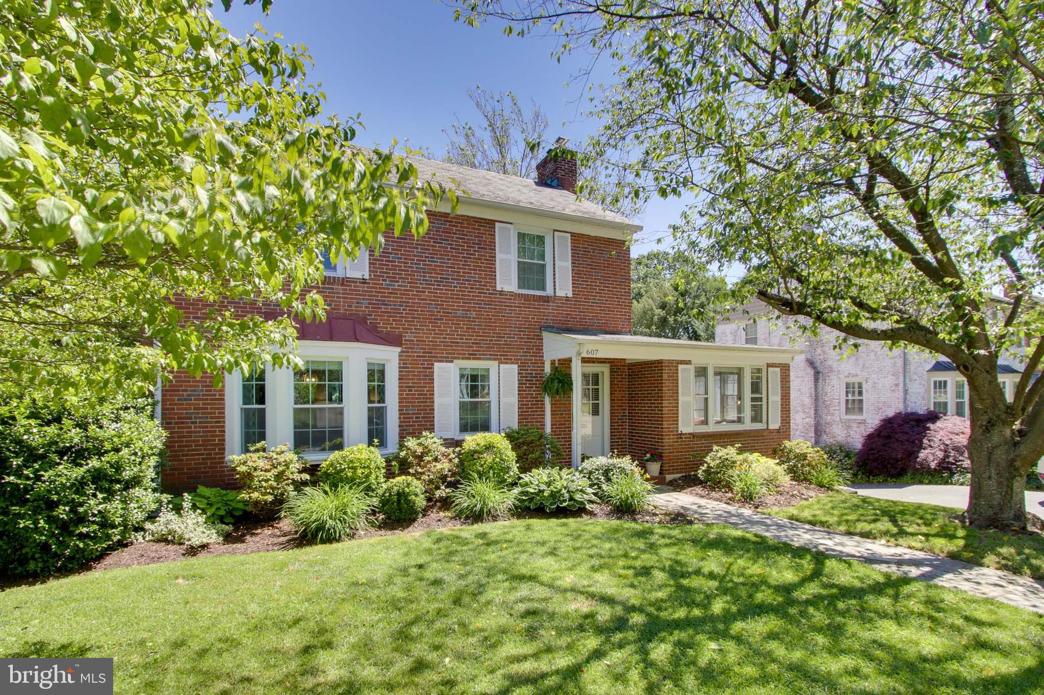 607 Worcester Road Baltimore, MD 21286 - Photo 4 of 42 a front view of house with yard and green space