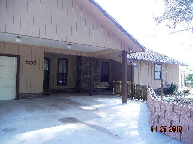 707 Griffin Bluff Road Kingsland, GA 31548 - Photo 1 of 1 a view of a house with furniture in front of house