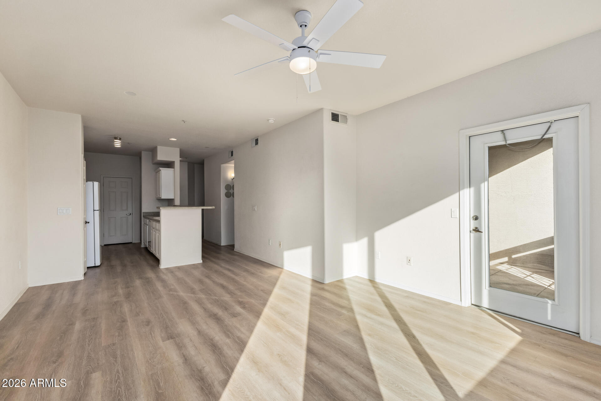 435 West Rio Salado Parkway, Unit 210 Tempe, AZ 85281 - Photo 8 of 35 a view of a kitchen with a sink and a refrigerator