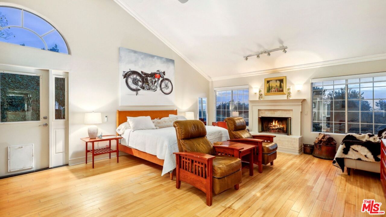 3548 Rosa Way Fallbrook, CA 92028 - Photo 22 of 49 a bed room with furniture and a fireplace