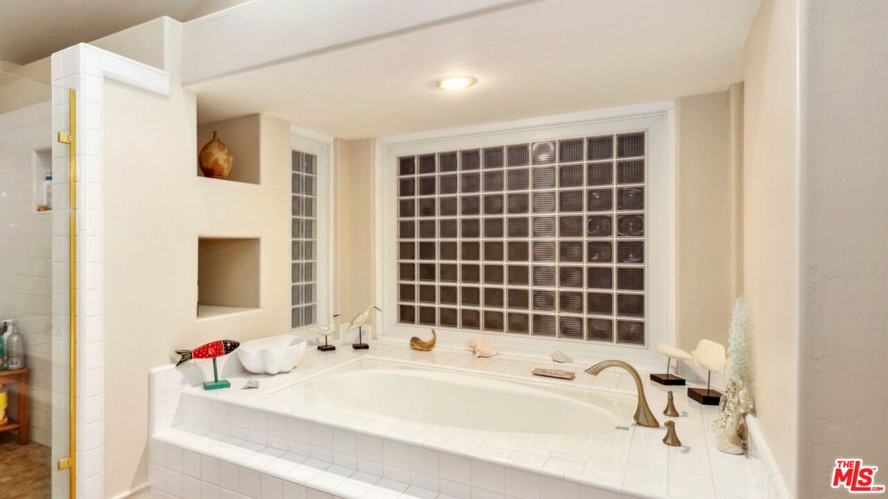 3548 Rosa Way Fallbrook, CA 92028 - Photo 24 of 49 a bathroom with a tub sink and a shower