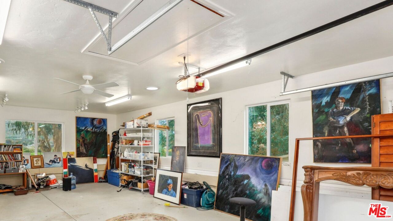 3548 Rosa Way Fallbrook, CA 92028 - Photo 39 of 49 a living room with lots of furniture and a flat screen tv