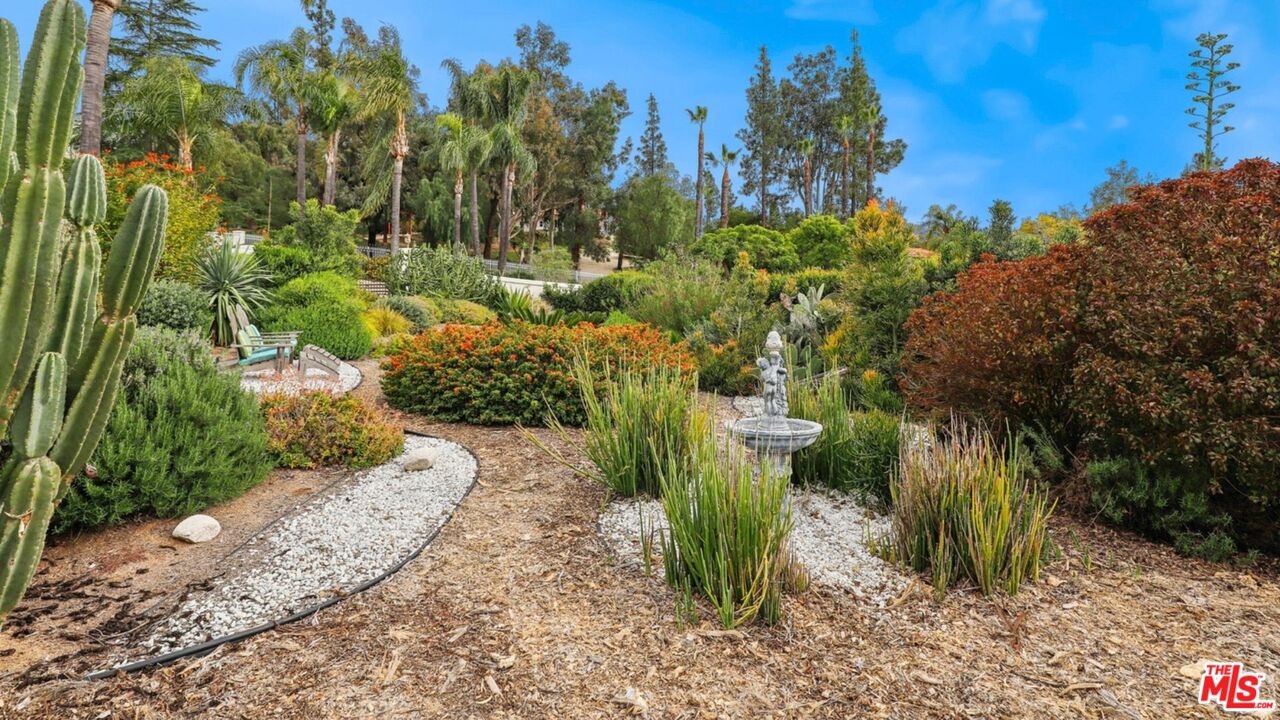 3548 Rosa Way Fallbrook, CA 92028 - Photo 46 of 49 a view of a garden with large trees
