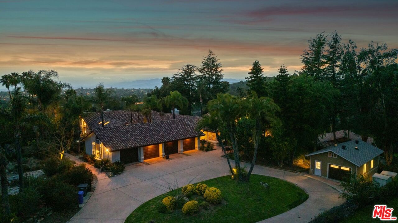 3548 Rosa Way Fallbrook, CA 92028 - Photo 6 of 49 a view of a big house with a big yard and potted plants