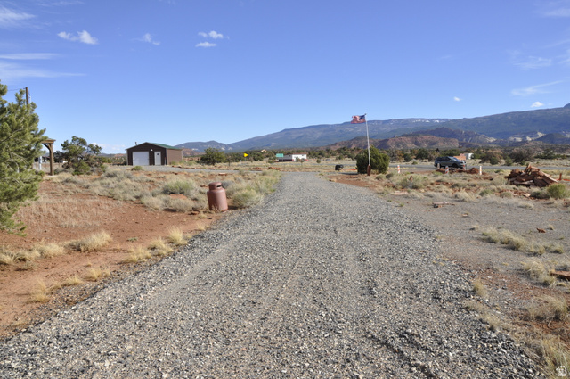 175 South S Highway East Torrey, UT 84775 - Photo 12 of 17 View of dirt / gravel road with a mountain view and a rural view