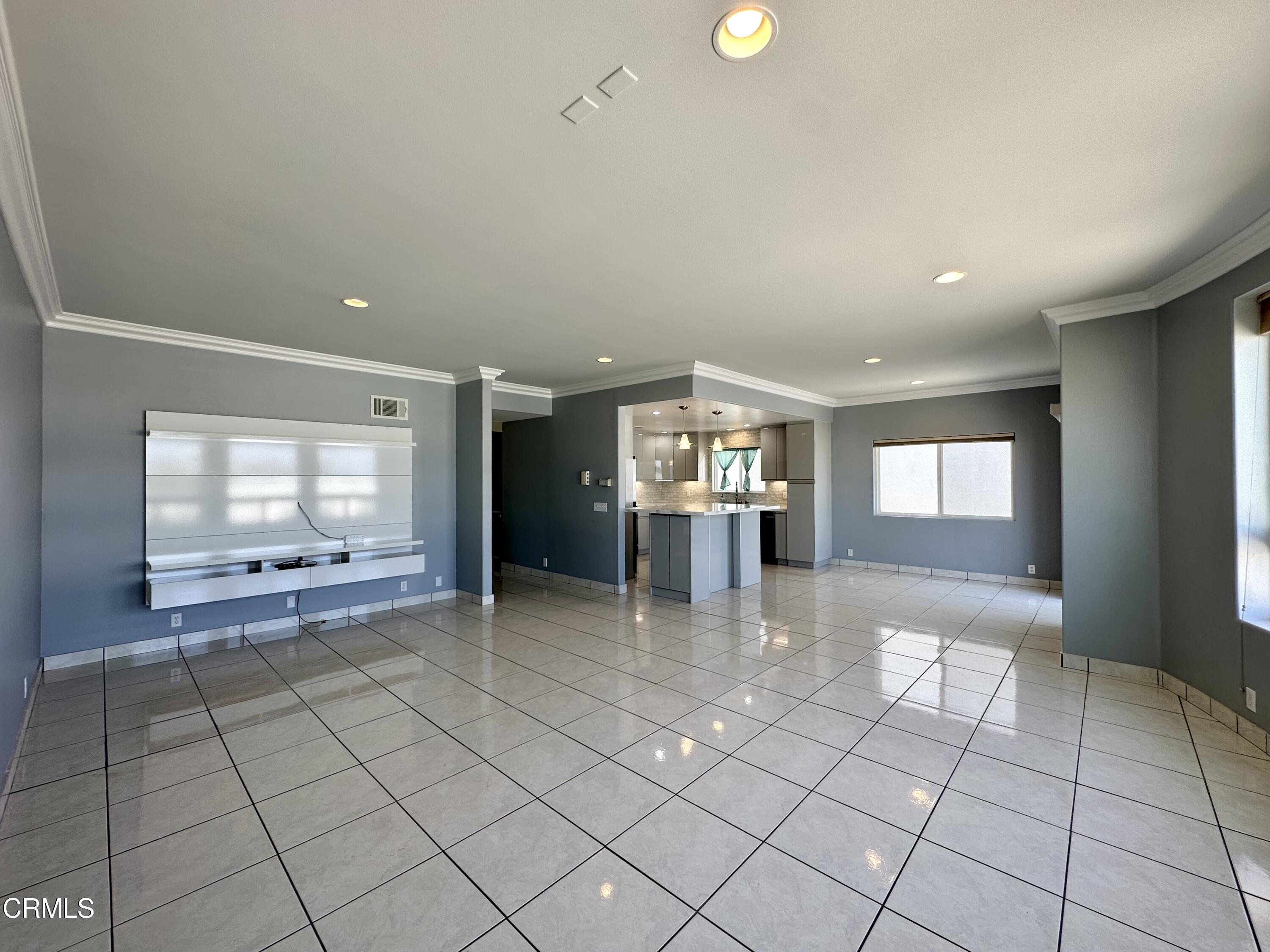 4053 Sunset Lane Oxnard, CA 93035 - Photo 6 of 33 a view of empty room with window and fireplace