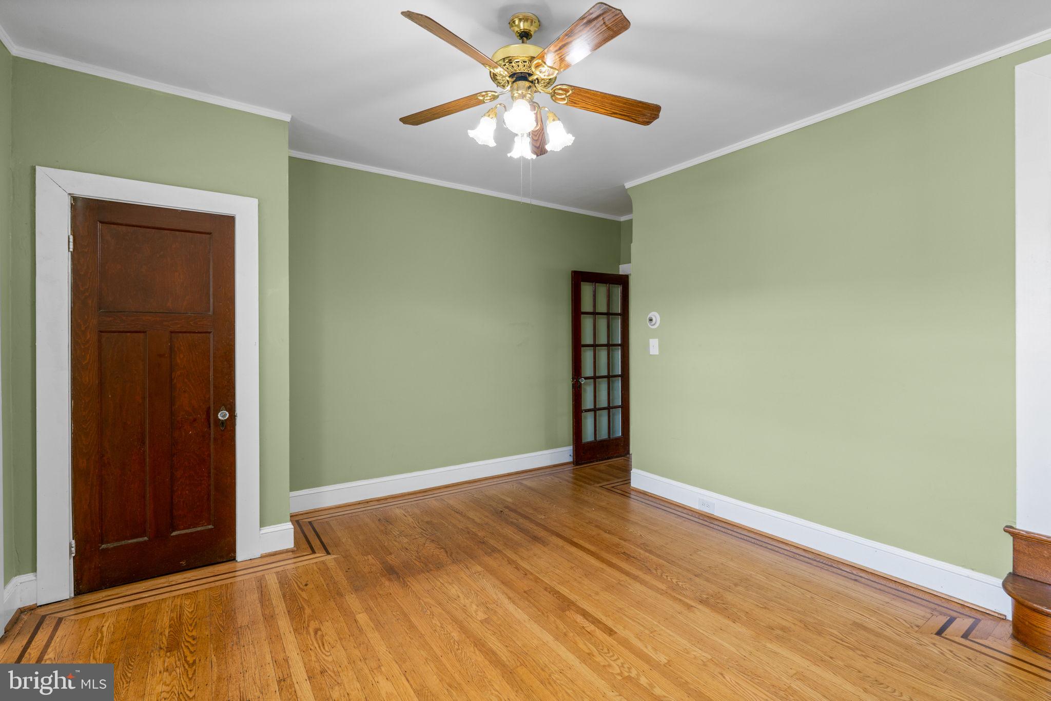 310 Drew Street Baltimore, MD 21224 - Photo 12 of 47 an empty room with closet and fan