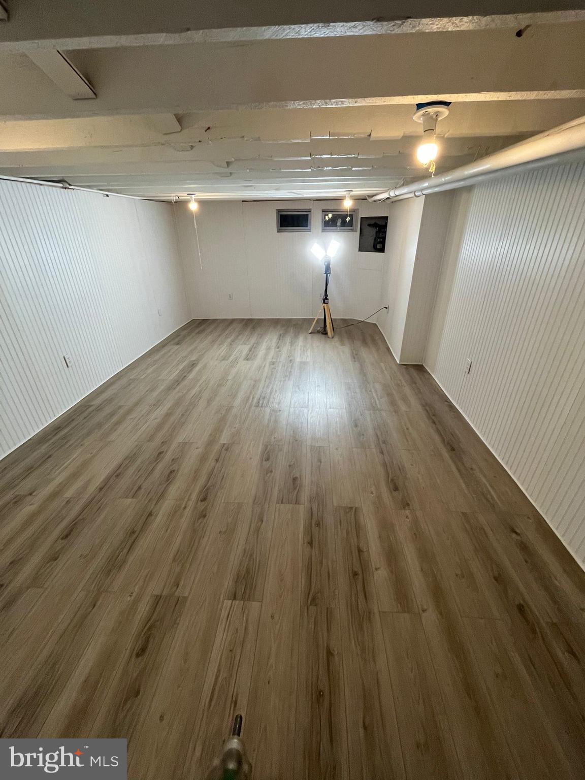 310 Drew Street Baltimore, MD 21224 - Photo 31 of 47 a view of a room with wooden floor