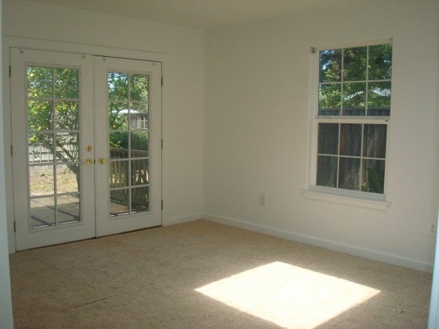 3401 Roland Drive Santa Cruz, CA 95062 - Photo 11 of 20 an empty room with windows