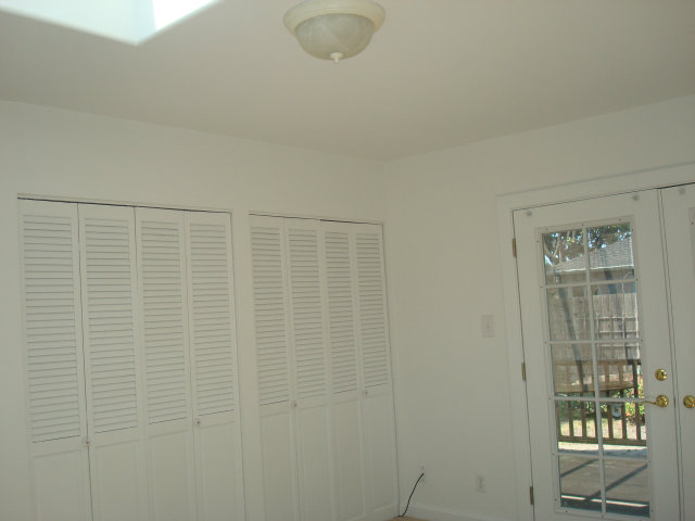 3401 Roland Drive Santa Cruz, CA 95062 - Photo 17 of 20 a bathroom with a shower curtain